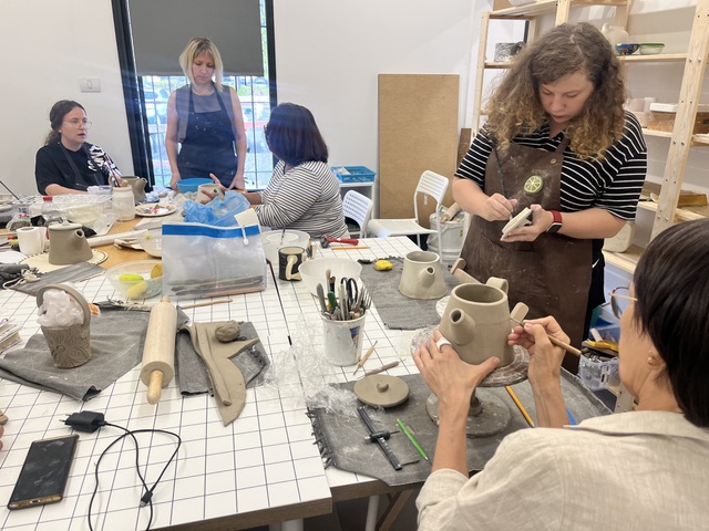 Adult ceramics class in session