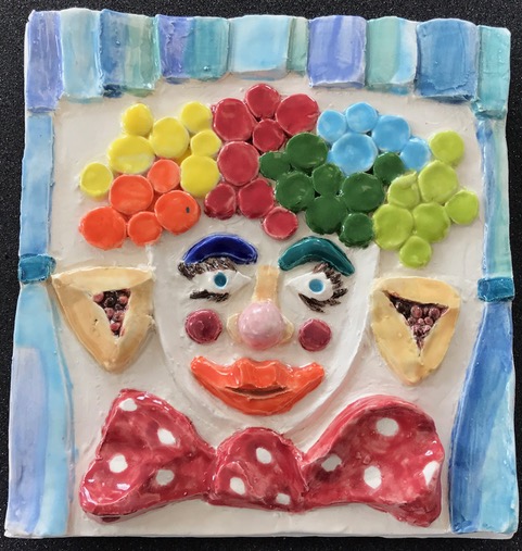 Colorful painted clown tile