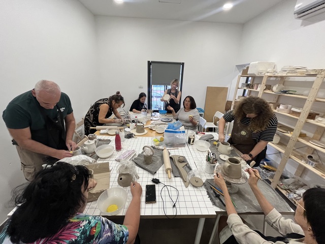 Adult class at the pottery wheels