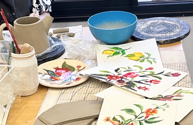 Watercolor references and ceramic vessel