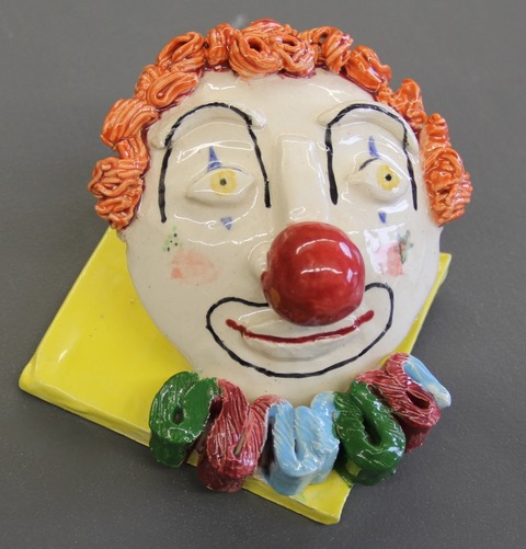 Painted clown face tile