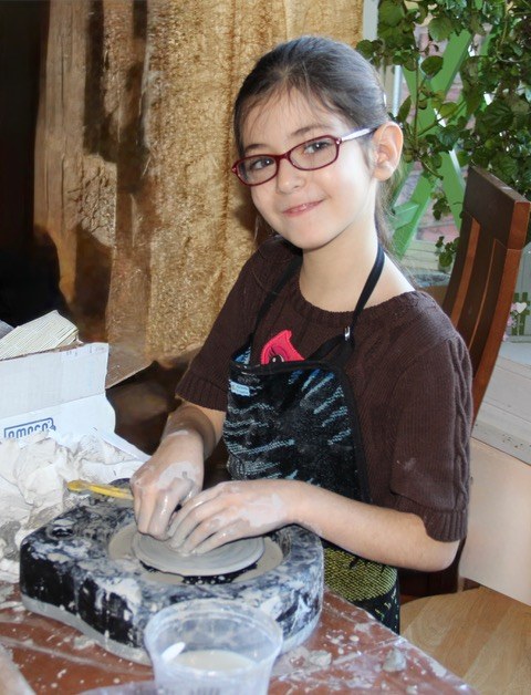 Student at the pottery wheel