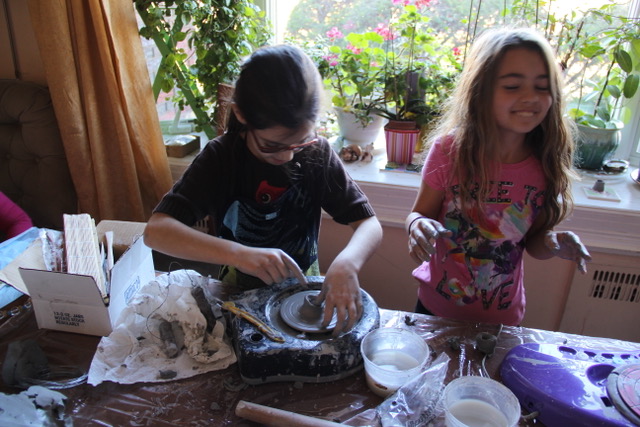 Student at the pottery wheel