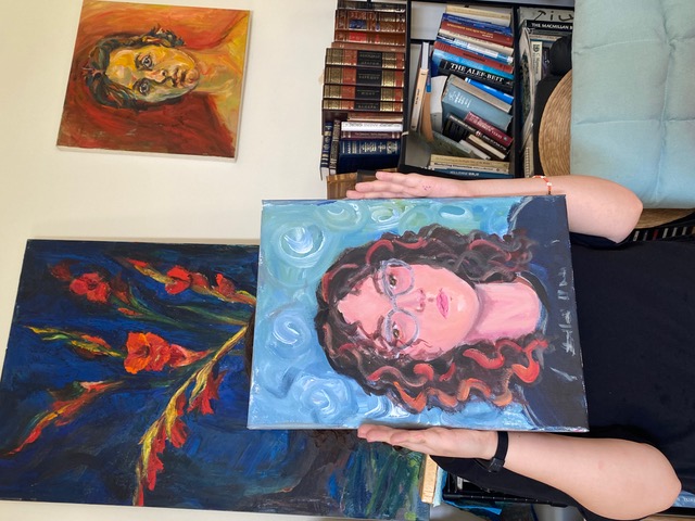 Student with portrait and still life
