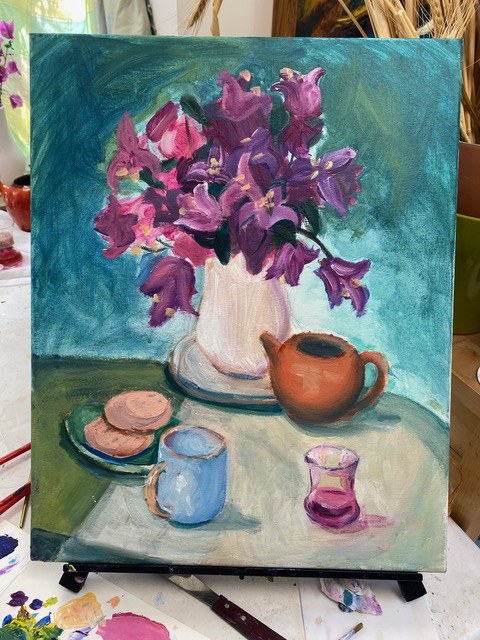 Still life with purple bouquet and teapot
