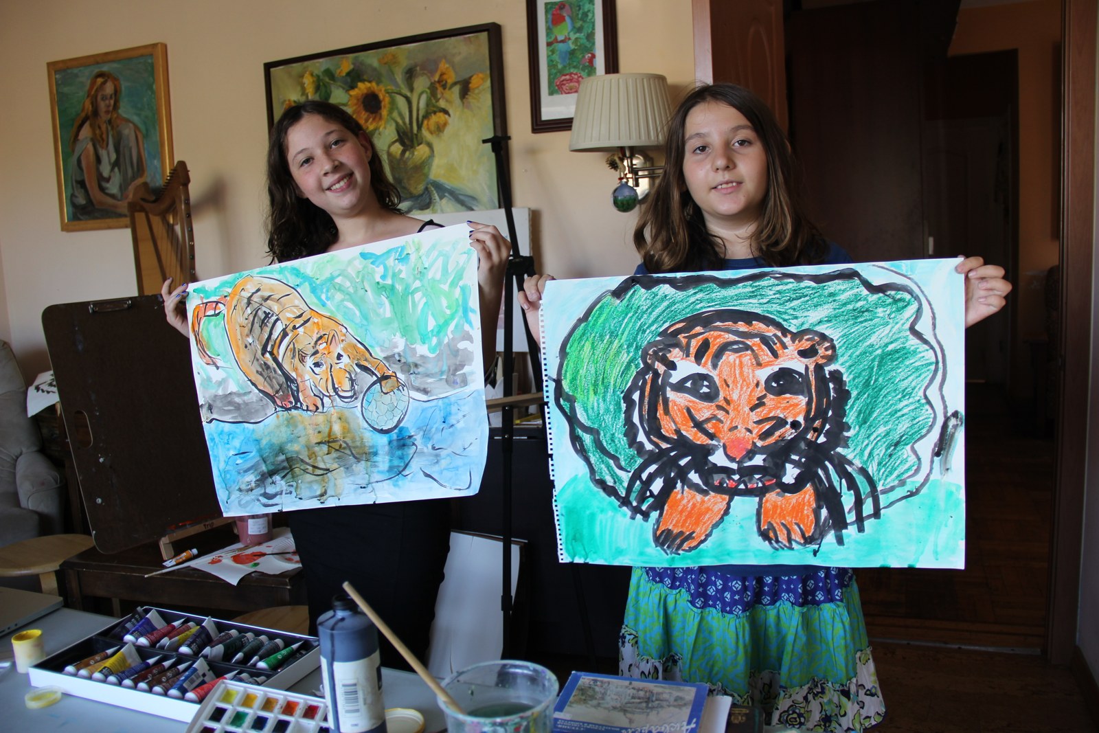 Students with their tiger paintings